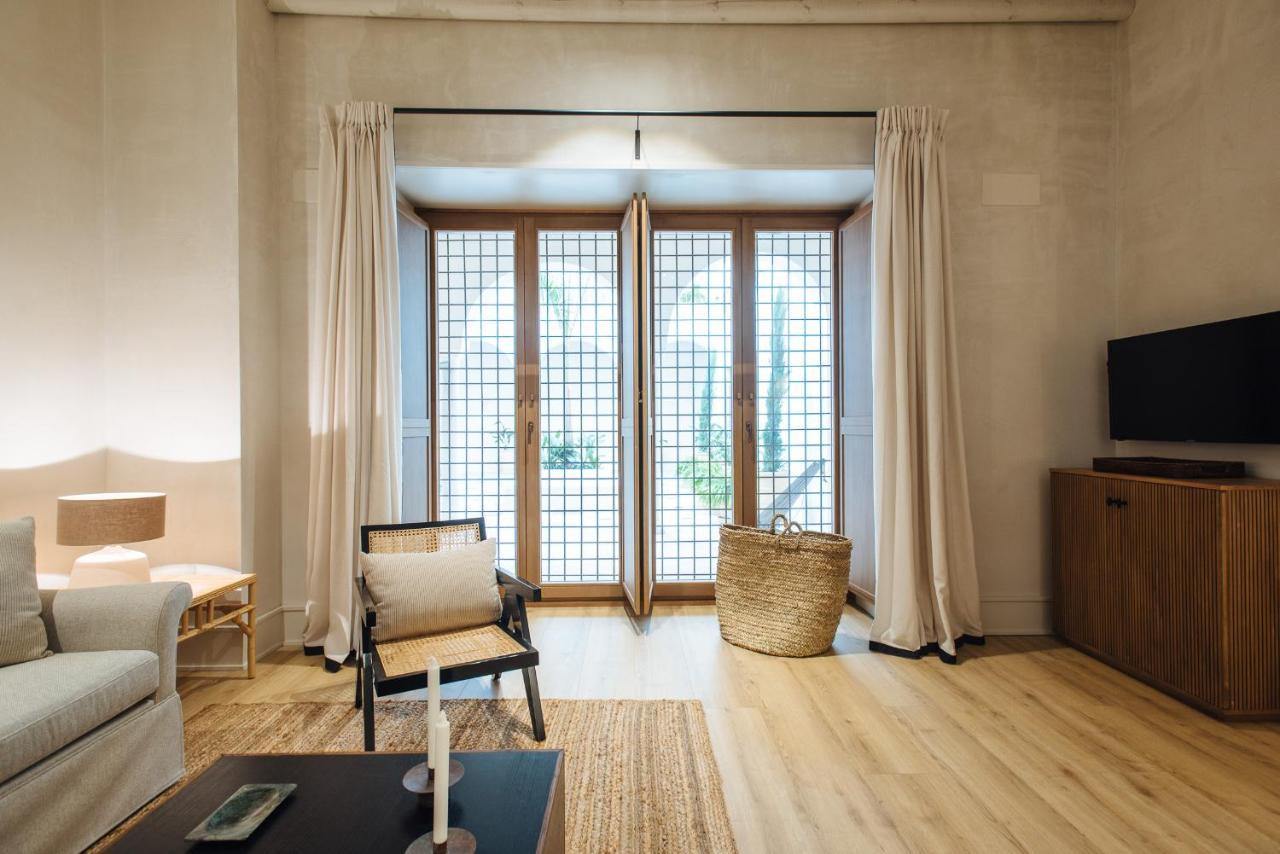 セビリア Casa Del Rey Sabioアパートホテル エクステリア 写真